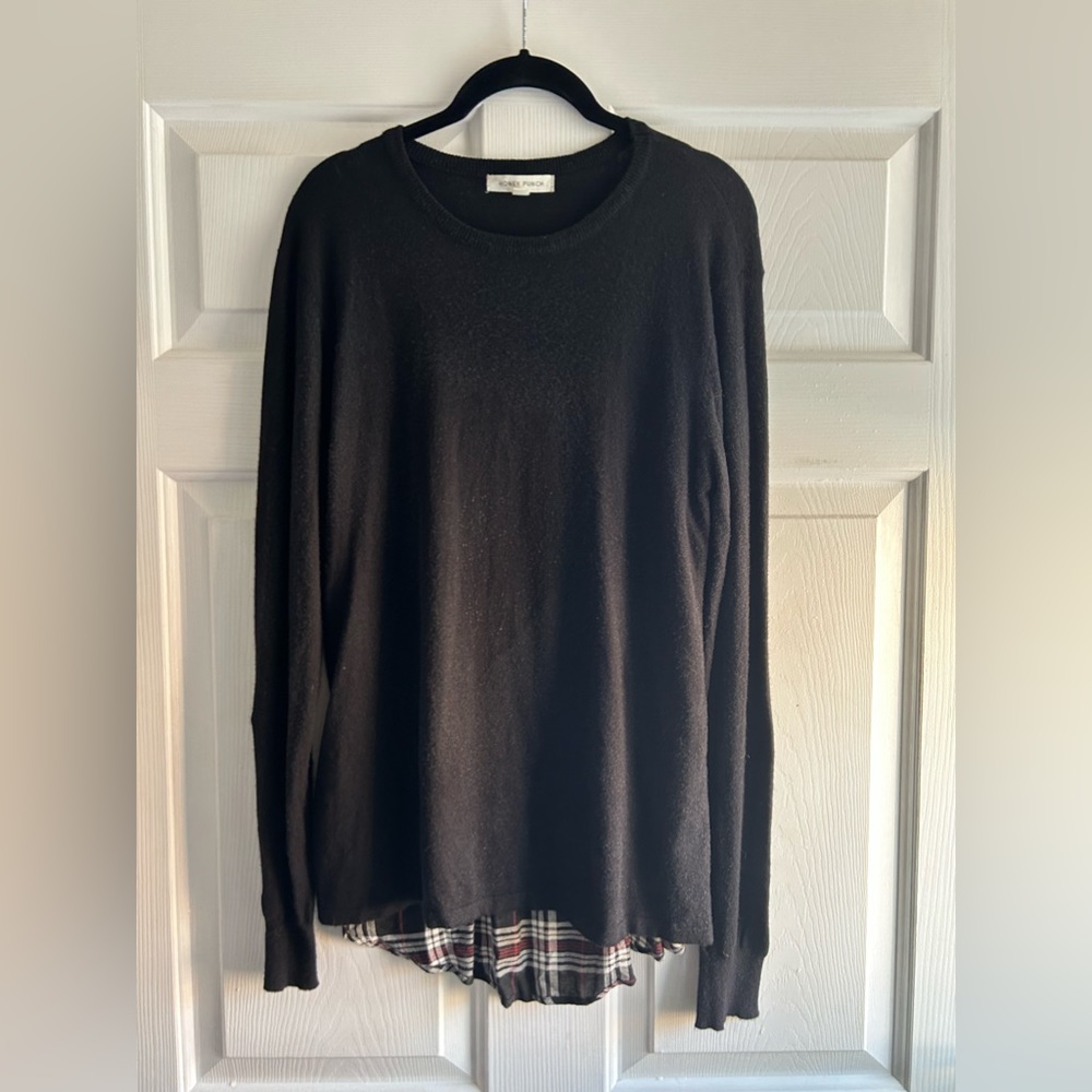 Black tunic sweater with plaid fabric back